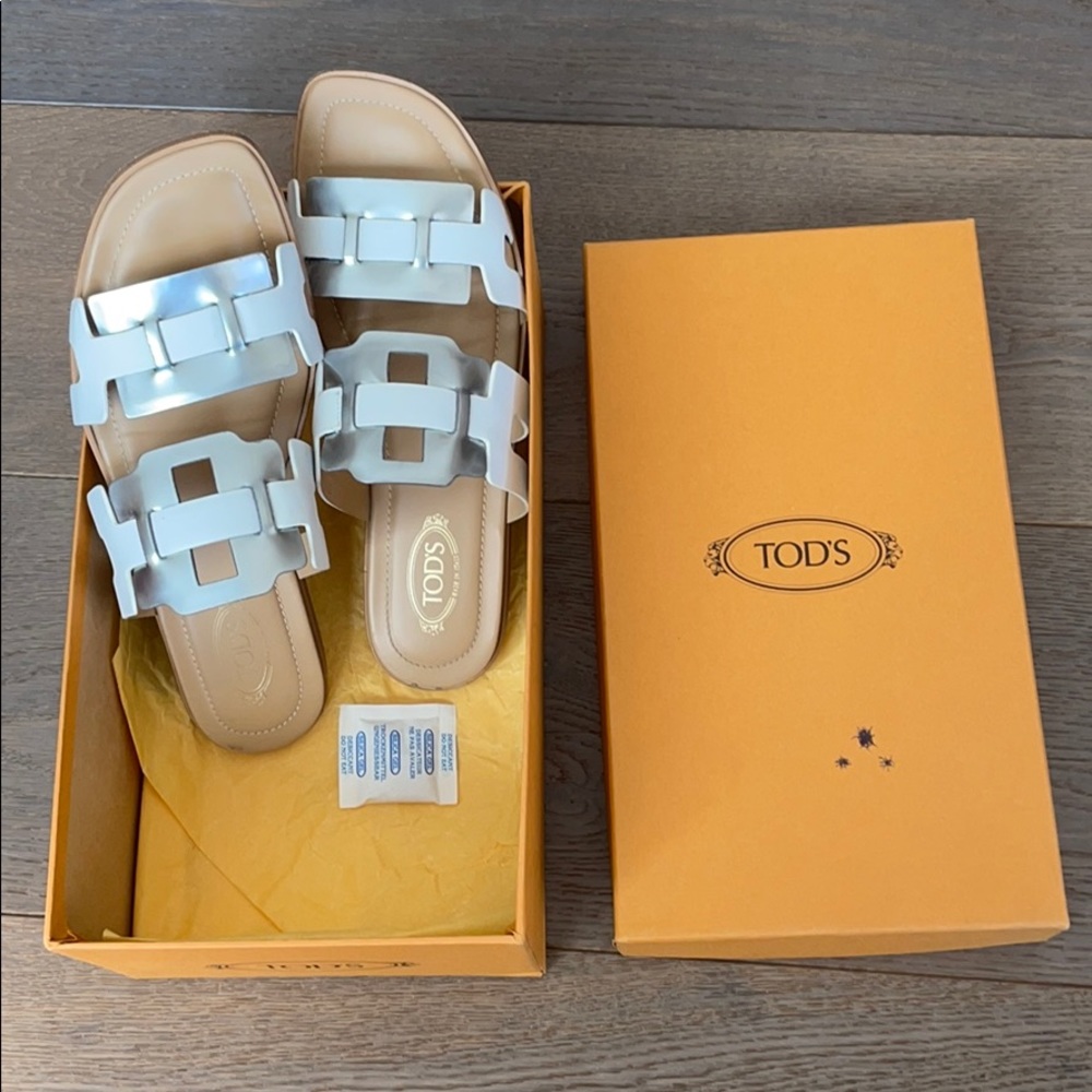 Tod’s silver and white sandals